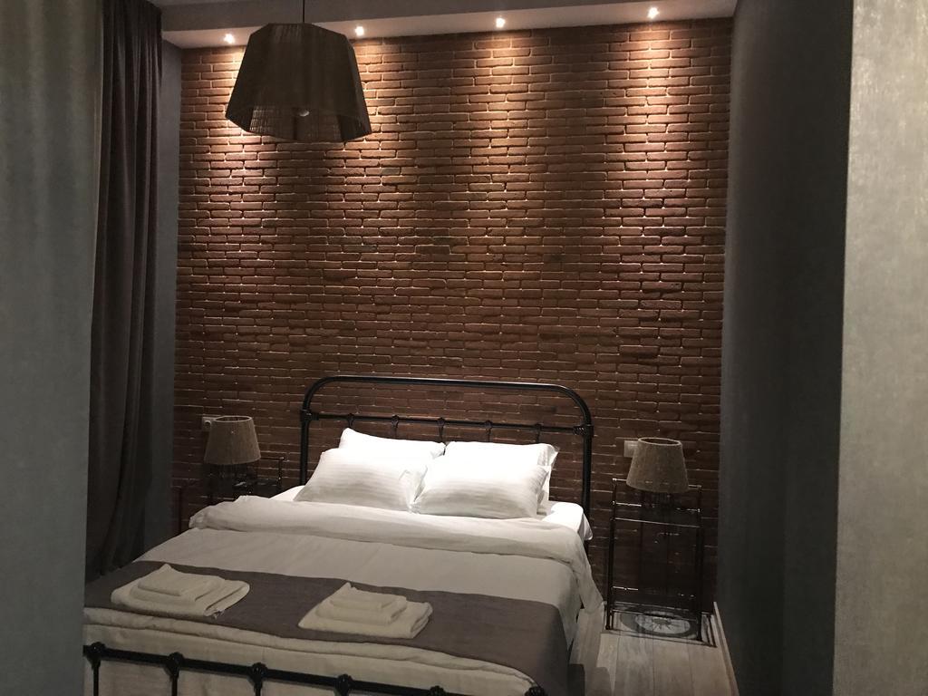 Oc Apartments Тбилиси Стая снимка
